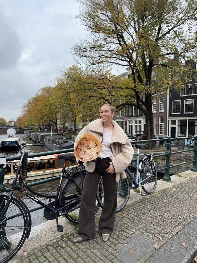 Manteau en peluche à manches longues et à gros revers en fourrure intégrée