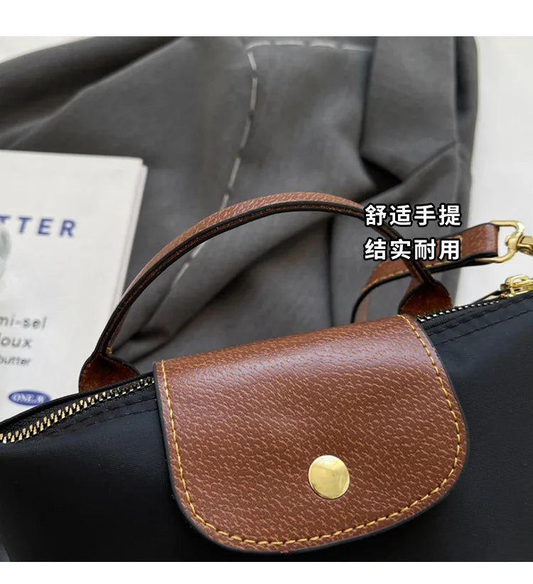 Retro Fashion Trend Hundreds of Shoulder Crossbody Women's Bag 2024 Early Spring New Niche Foreign Premium Feeling Handbag