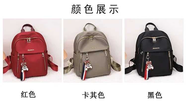 2024 Women's New Solid Color Zipper Waterproof Nylon Fashion Backpack Large Capacity Casual and Versatile Commuting Backpack